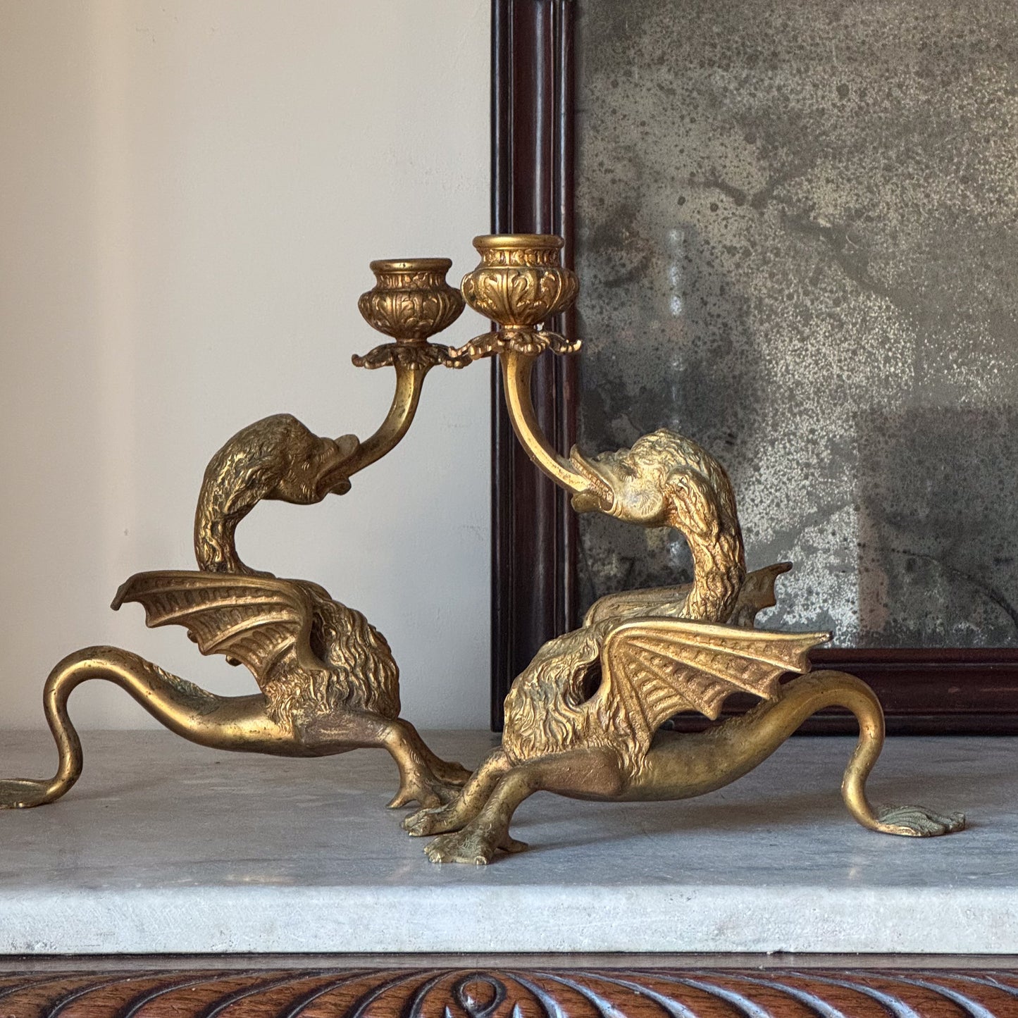 A Pair of Late 19th Century Gilt Brass Wyvern Candlesticks
