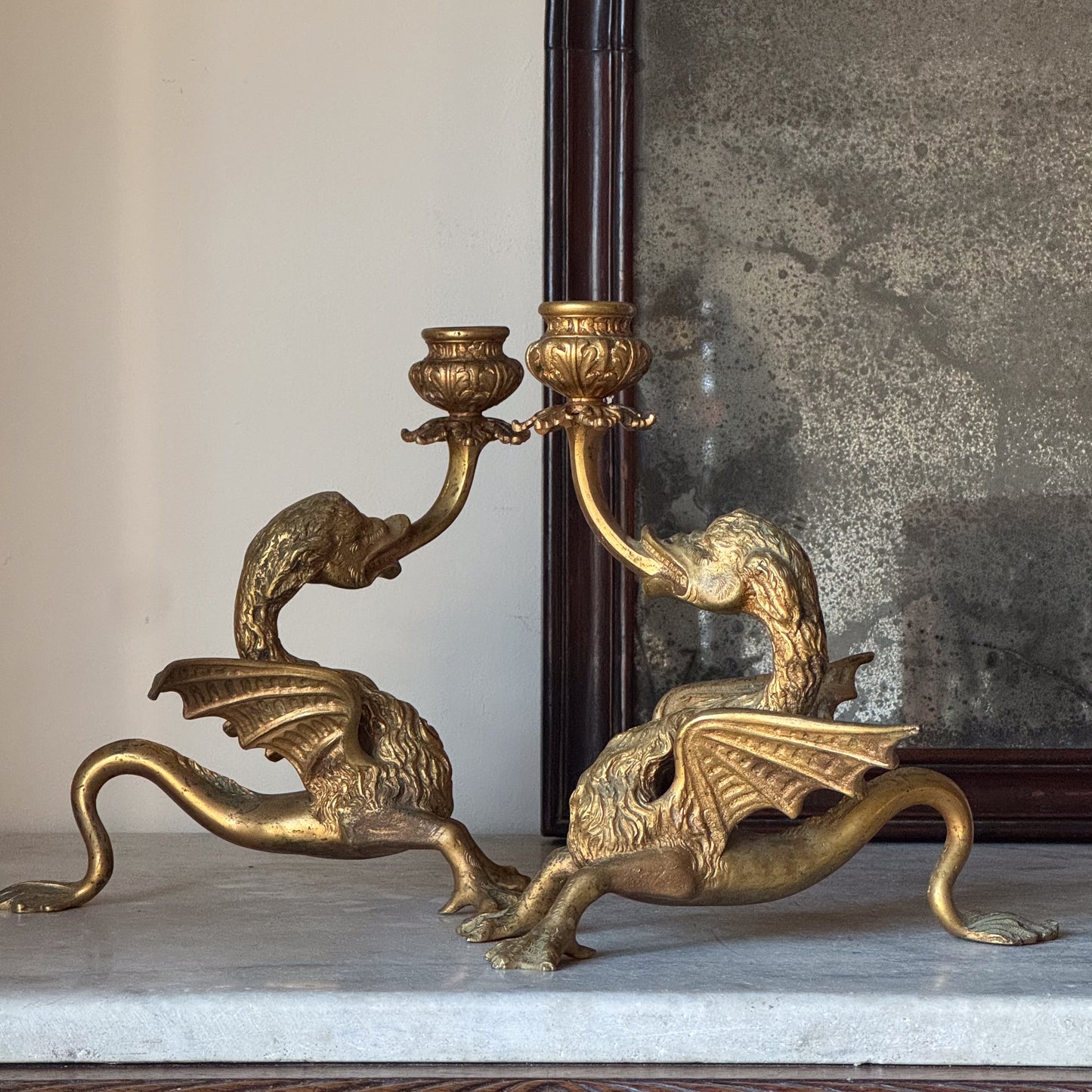 A Pair of Late 19th Century Gilt Brass Wyvern Candlesticks