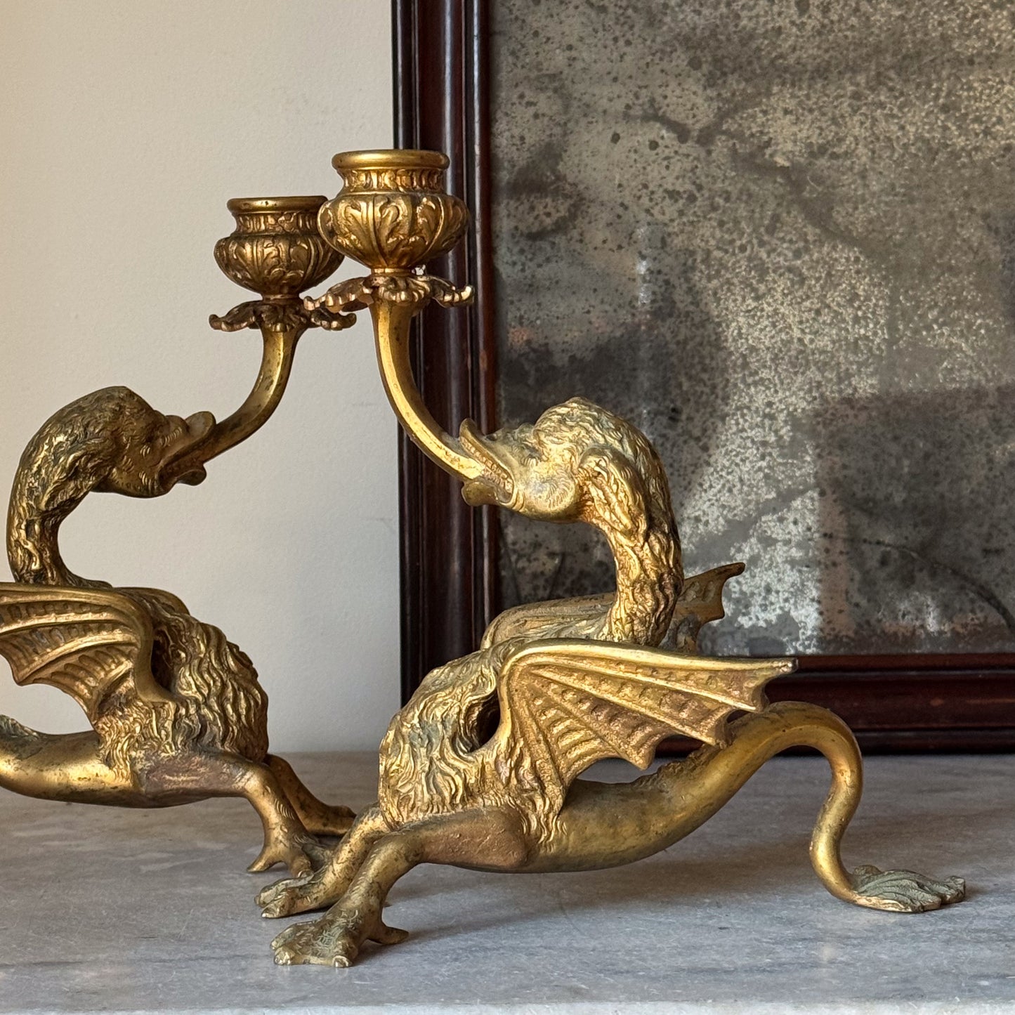 A Pair of Late 19th Century Gilt Brass Wyvern Candlesticks