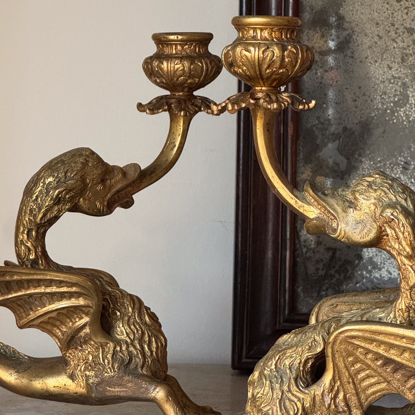 A Pair of Late 19th Century Gilt Brass Wyvern Candlesticks