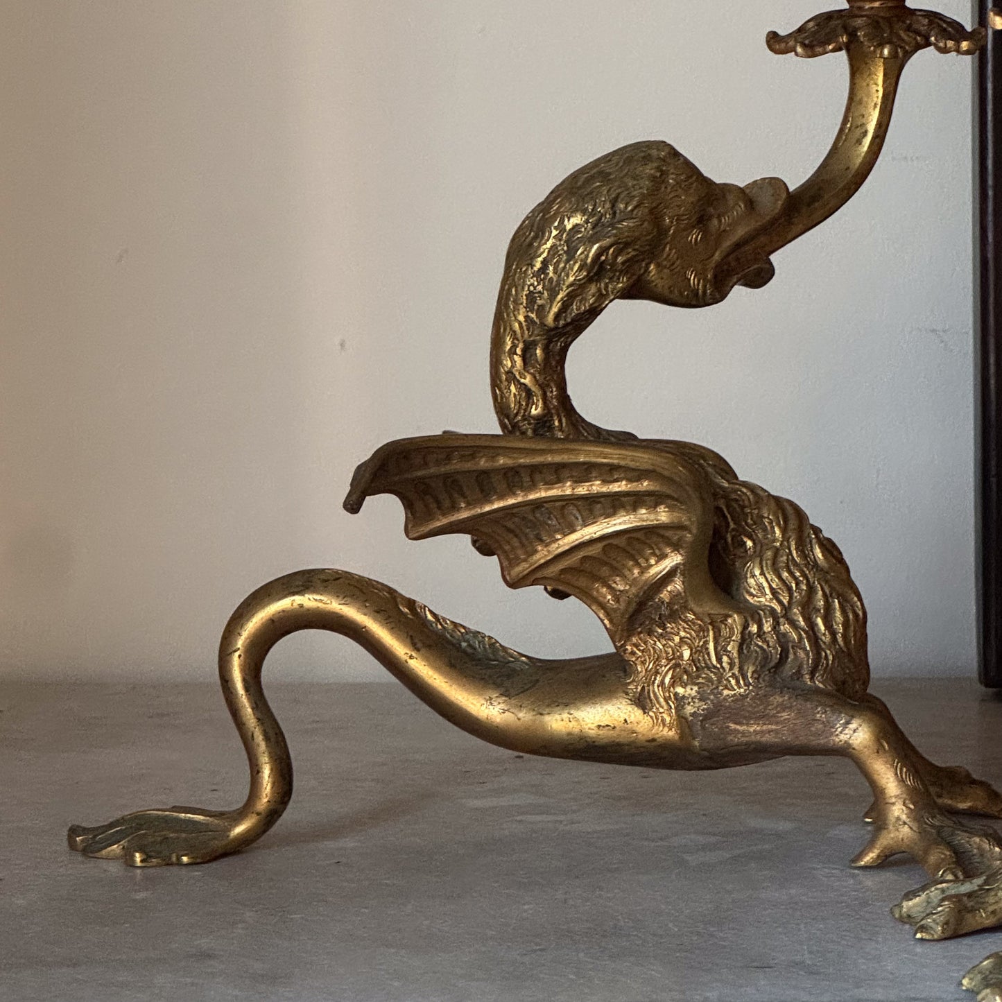 A Pair of Late 19th Century Gilt Brass Wyvern Candlesticks