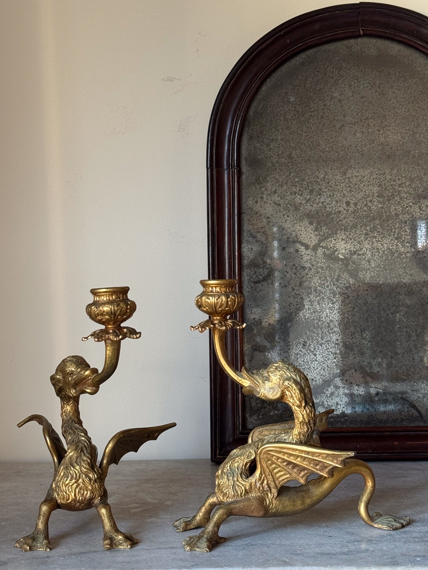 A Pair of Late 19th Century Gilt Brass Wyvern Candlesticks