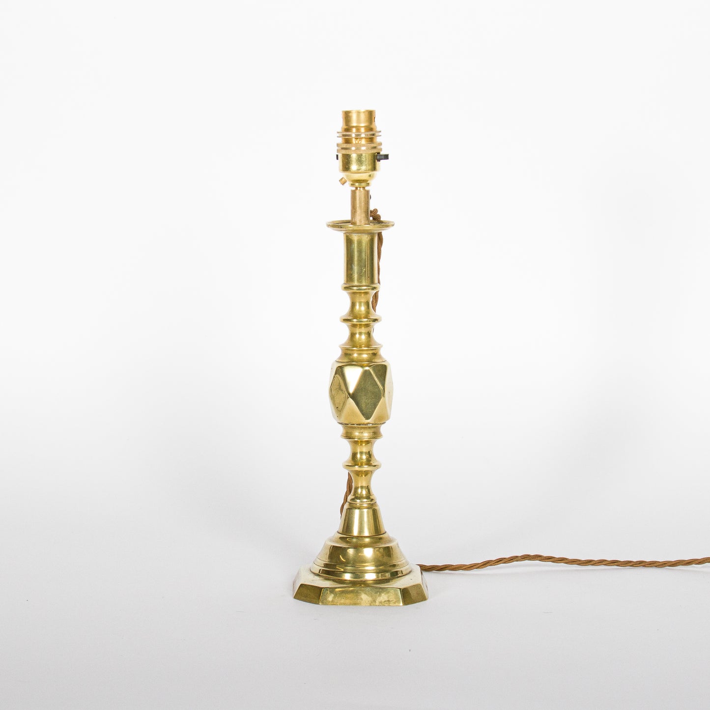 A pair of brass candlesticks converted to lamps - ’The Diamond Princess’