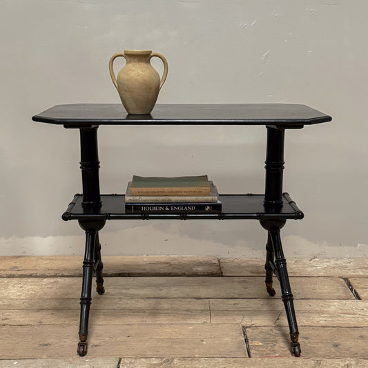 An Aesthetic Movement Ebonised Tiered Table