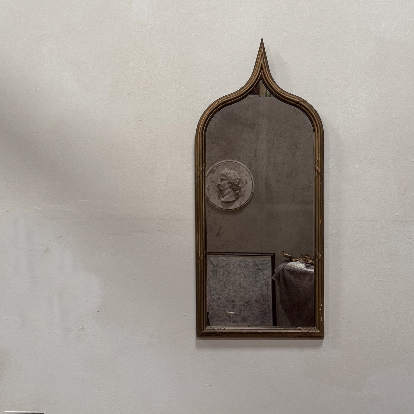 A Late 19th Century Gothic Gilt Mirror