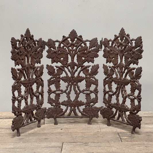 An Arts & Crafts Cast Iron Fire Guard