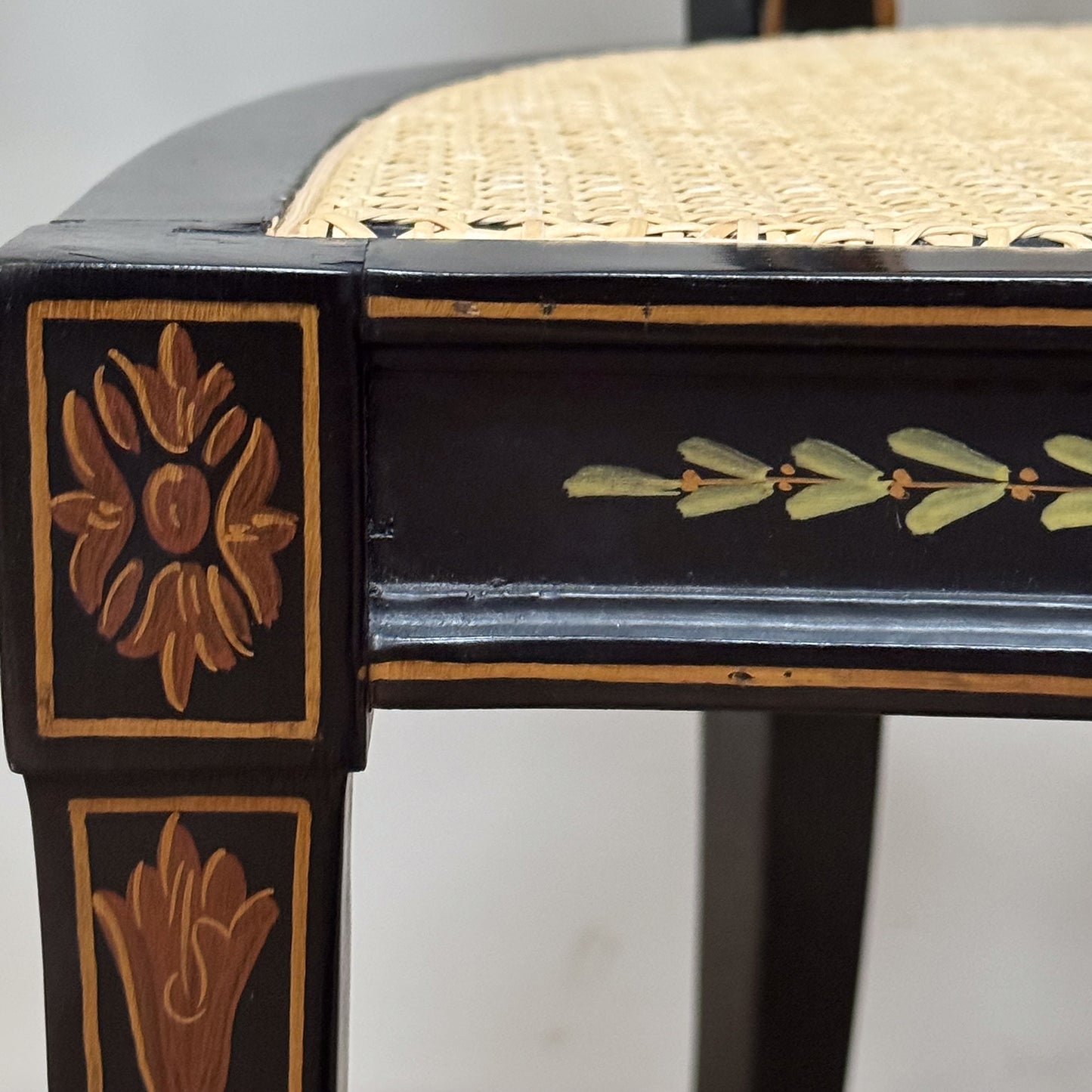 A Pair George III Style Ebonised and Polychrome Painted Open Armchairs