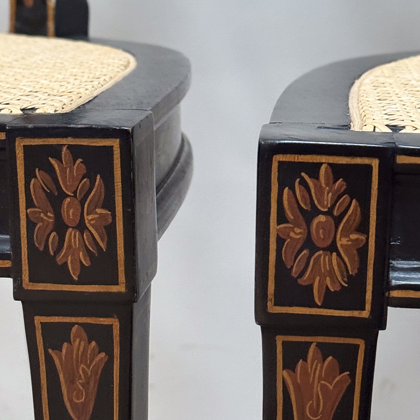 A Pair George III Style Ebonised and Polychrome Painted Open Armchairs