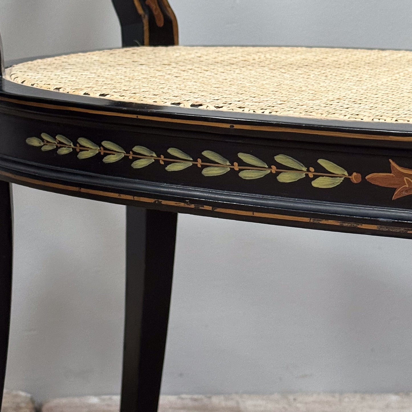 A Pair George III Style Ebonised and Polychrome Painted Open Armchairs