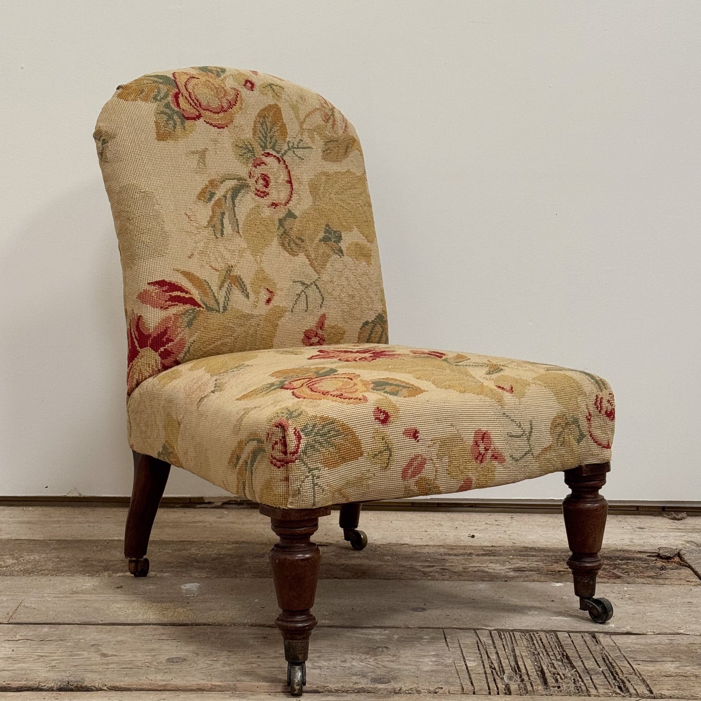 A Mid 19th Century Needlepoint Slipper Chair