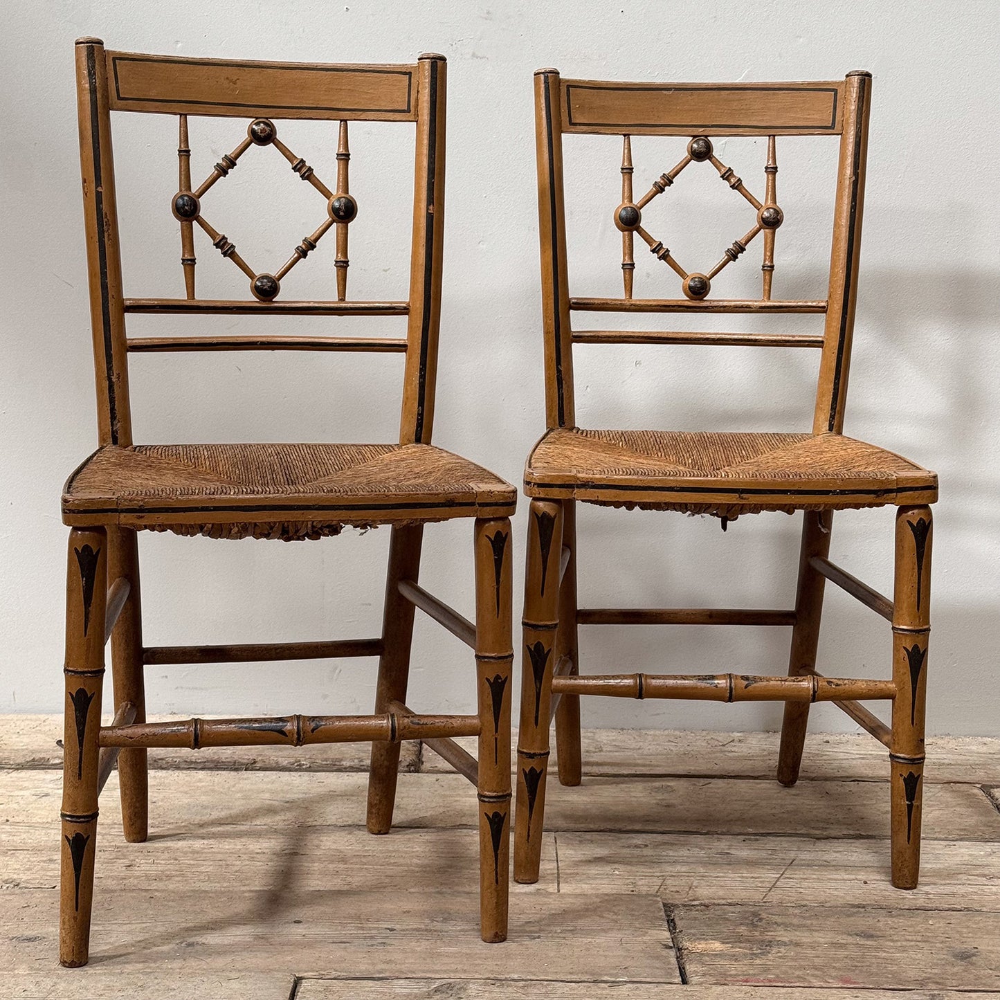 A Pair of Regency Painted Side Chairs