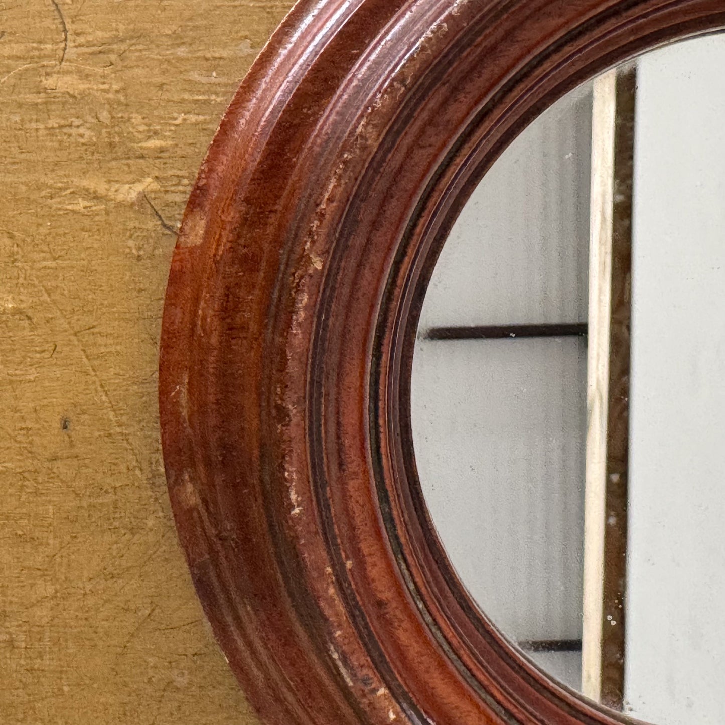 A Mid 19th Century Porthole Framed Mirror