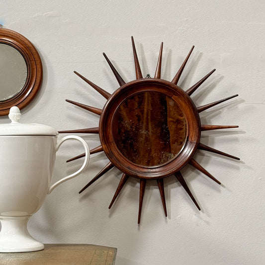 An Early 20th Century Mahogany Sunburst Mirror