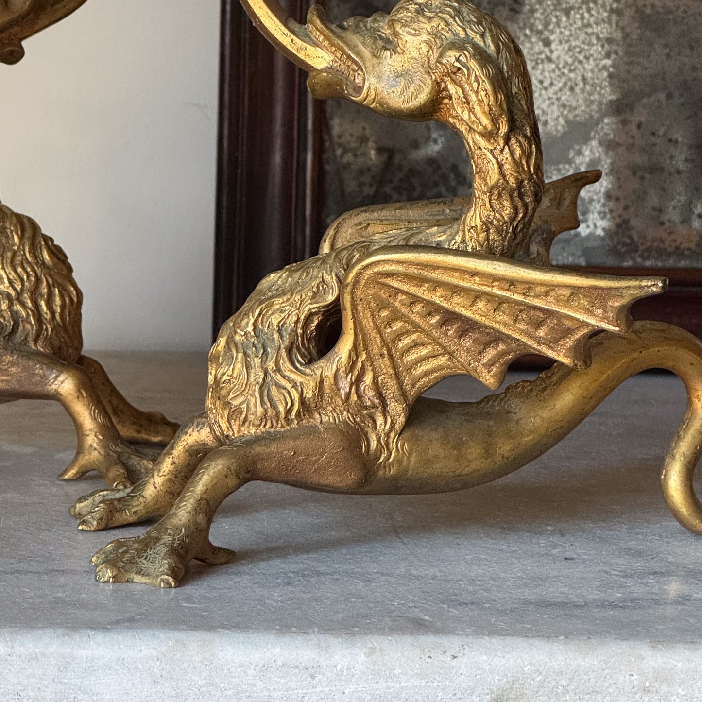 A Pair of Late 19th Century Gilt Brass Wyvern Candlesticks