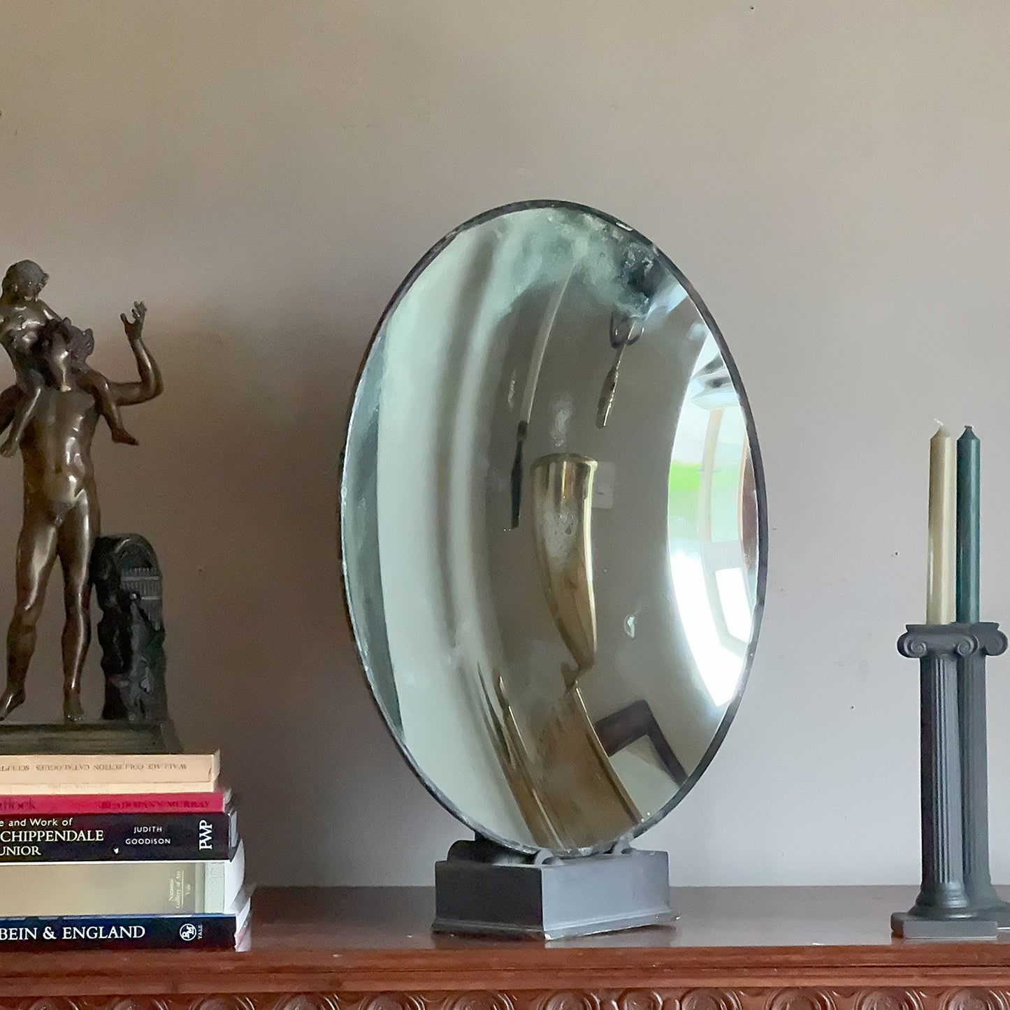 A Parabolic Mirror on Regency Stand