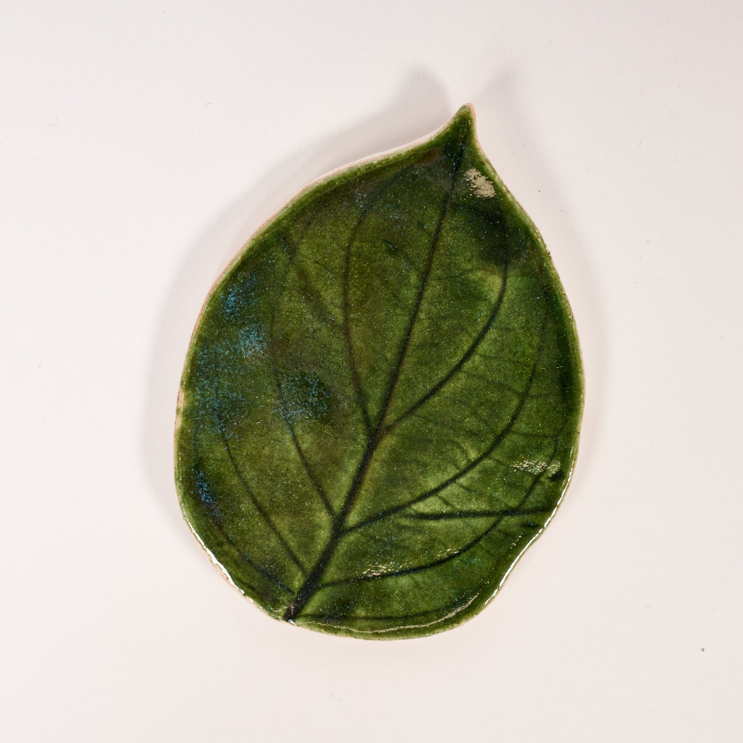 Small pottery leaf